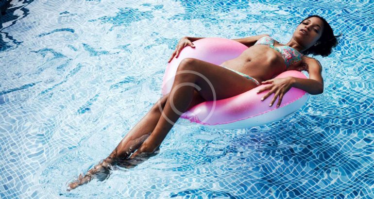 Portrait of a girl,on pool,enjoy sunlight